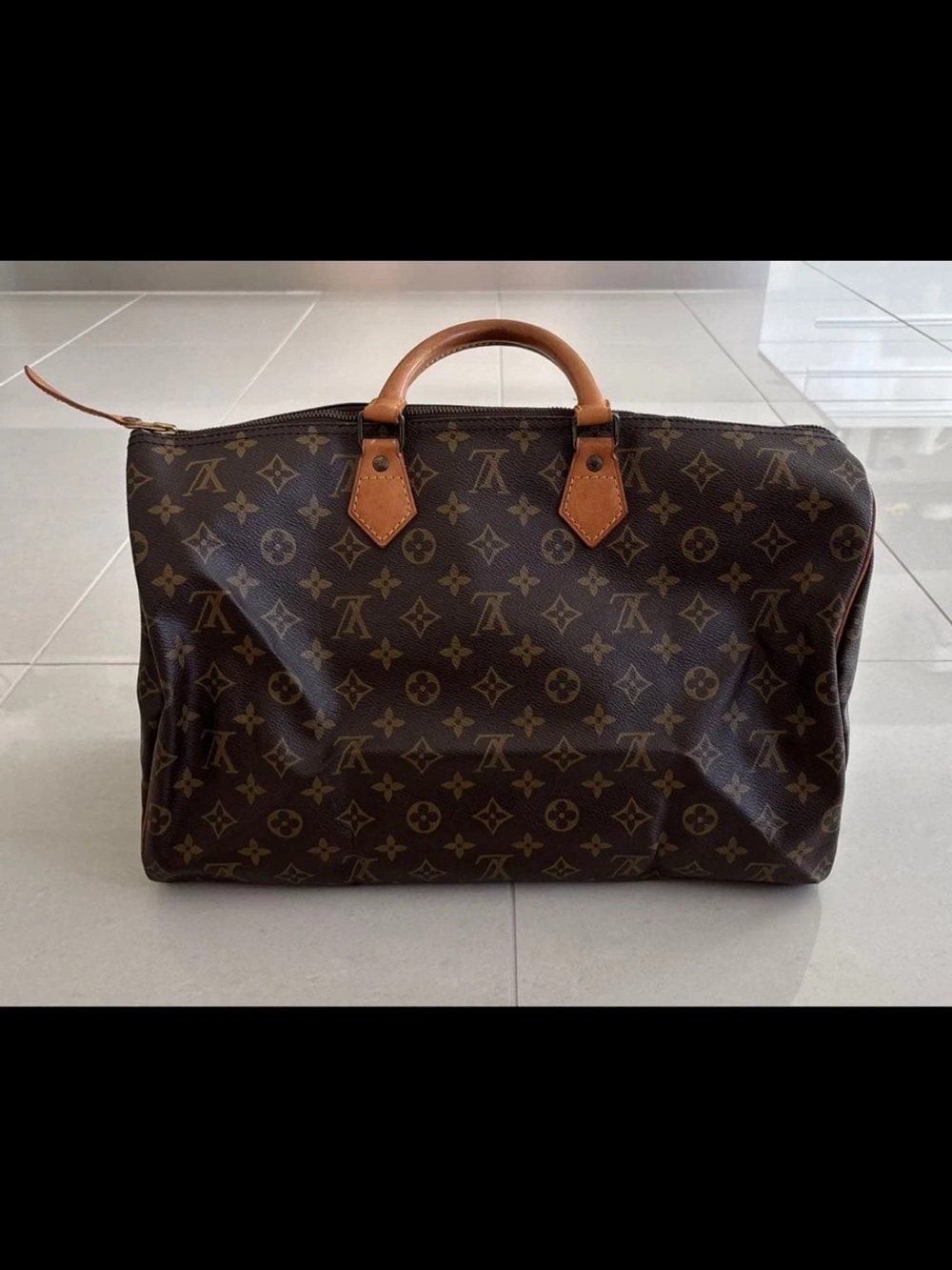 Louis Vuitton Monogram Canvas Duffel with Natural Vachetta Trim